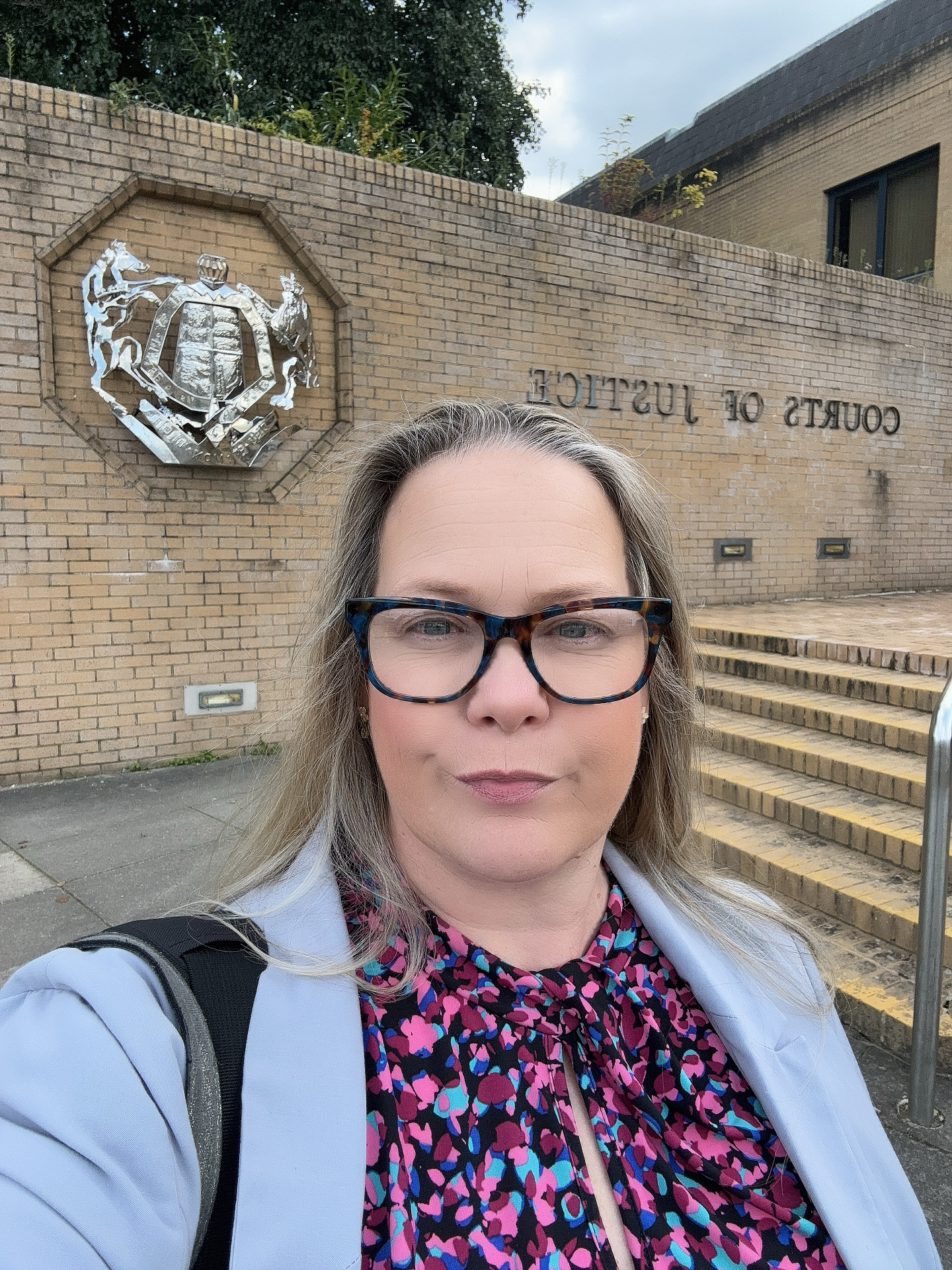 Alison McRobbie outside Courts of Justice — as featured in The Sun